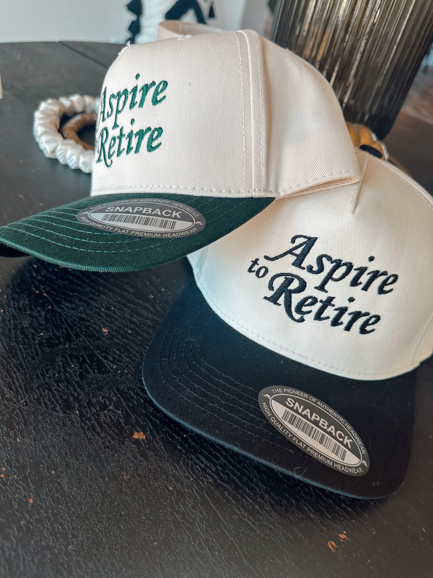 Aspire to Retire Trucker Hat